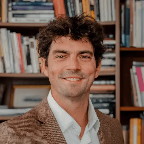 Bill Walker smiling in a dark jacket