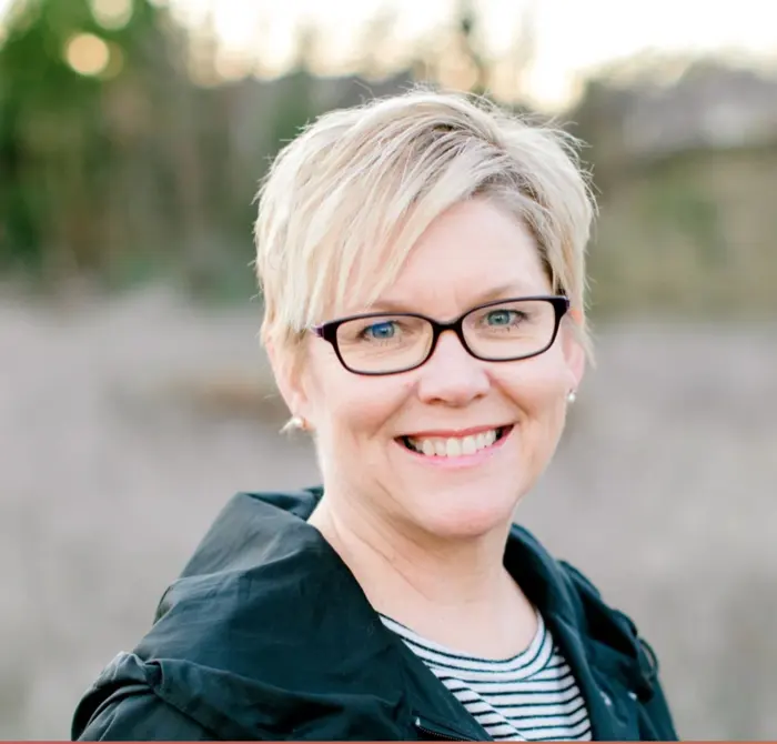 Tami Peterson smiling outdoors